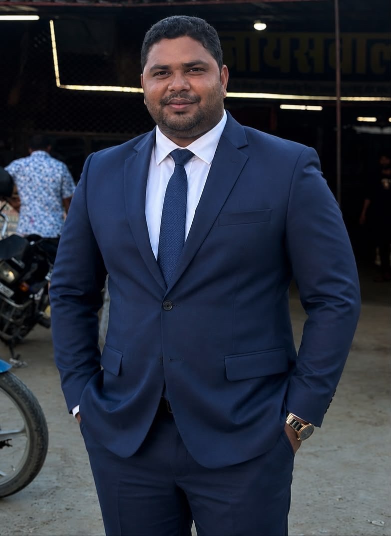 Goldi Kumar in formal attire